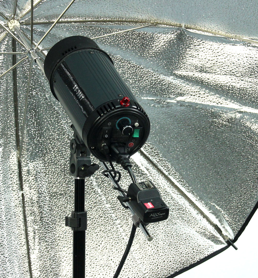 https://www.alzodigital.com/cdn/shop/products/1093-ALZO-Wireless-Flash-Trigger-Speedlight-Kit-16-Channel-receiver-umbrella-rod_1200x.png?v=1531430965